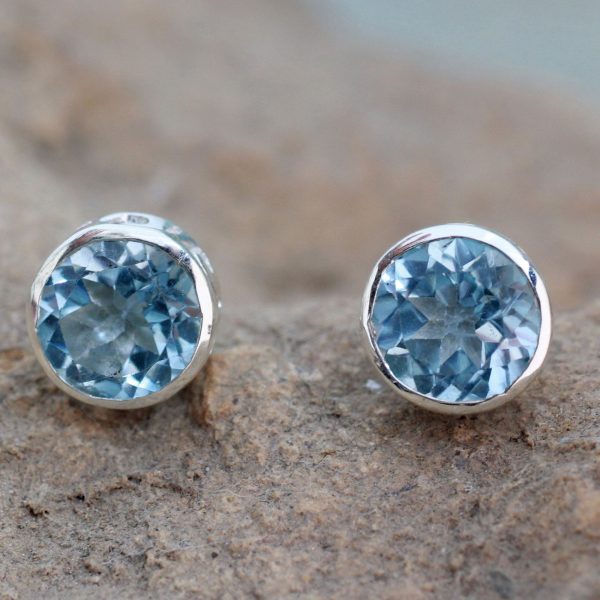 Spark of Life Blue Topaz Silver Wave Earrings Online